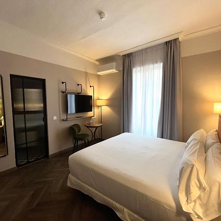 The Honest Hotel & Apartments เซบีญา ภายนอก รูปภาพ